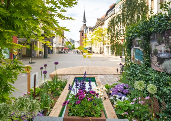 Blick aus einem Stadtgarten heraus am Brunneneck in der Oldenburger Innenstadt in Richtung Lappan im Jahr 2021.